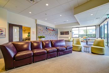 Indoor Playroom with Climbing Wall at Discovery West Apartments in  Issaquah, WA 98029